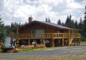 Deck attached to a log cabin