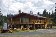 Deck attached to a log cabin